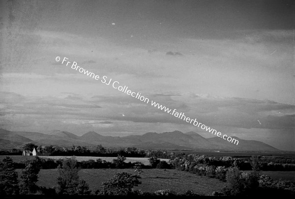 DISTANT VIEW OF CARLINGFORD AND MOURNE MOUNTAINS NEAR DILLONSTOWN